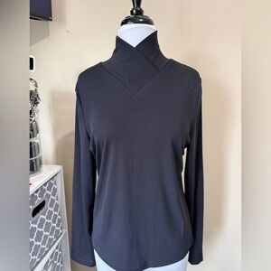 Turtle neck with cross cross detail. New, no tags.